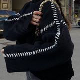 Contrast whipstitching turtleneck sweater