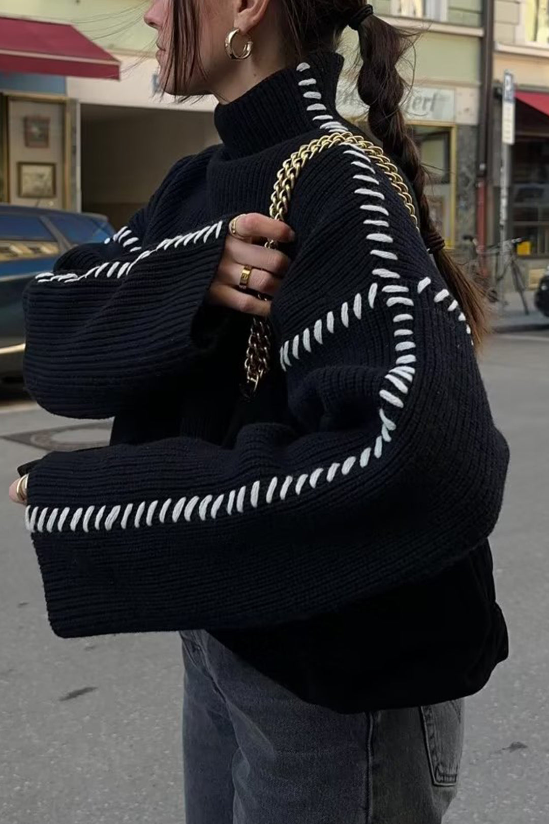 Contrast whipstitching turtleneck sweater